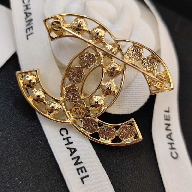 Ch**el brooches